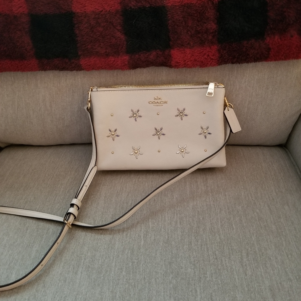 Coach cross body purse ivory with bejeweled flowers or snowflakes